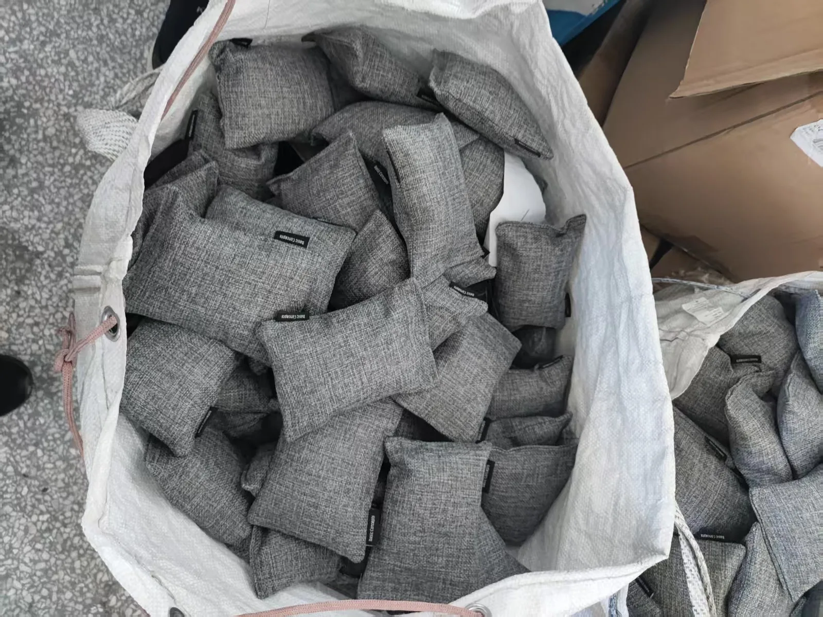 Bulk charcoal pouches with sewn side labels
